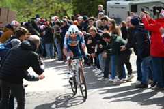 LIEGE BELGIUM APRIL 24 Romain Bardet of France and Team dsmfirmenich PostNL competes in the chase group while fans cheer during the 110th Liege Bastogne Liege 2024 Mens Elite a 2545km one day race from Liege to UCIWT on April 24 2024 in Liege Belgium Photo by Dario BelingheriGetty Images