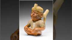 A ceramic vessel depicting a man with a cleft lip.