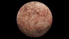 A reddish brownish planet sits in the darkness of space
