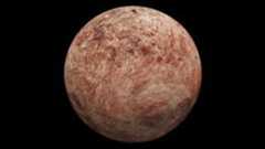 A reddish brownish planet sits in the darkness of space
