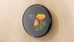 Google Nest Learning Thermostat with seasonal poppy face