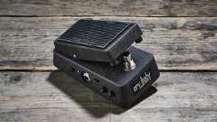 A Dunlop Cry Baby mini wah pedal on a wooden floor