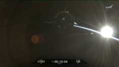 SpaceX Crew-12 Dragon flies free over the Earth during a sunrise