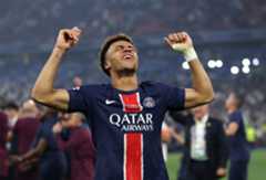 Desire Doue celebrates PSG's Champions League triumph