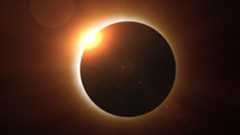 During a total solar eclipse, the moon blocks out the disk of the sun.