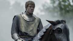 Ser Duncan the Tall looking determined while sitting on an armored horse in A Knight of the Seven Kingdoms