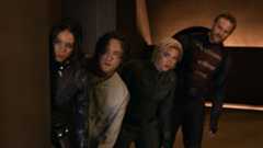 Ghost, Bob, Yelena, and John Walker peeking around a corner in Thunderbolts