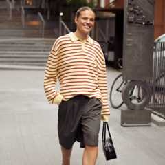 Mija Porter wearing a rugby shirt and skirt