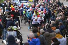 LIEGE BELGIUM APRIL 24 Domen Novak of Slovenia Marc Hirschi of Switzerland and Tadej Pogacar of Slovenia and UAE Team Emirates lead the peloton climbing the climbing the Cte de Stockeu while fans cheer during the 110th Liege Bastogne Liege 2024 Mens Elite a 2545km one day race from Liege to UCIWT on April 24 2024 in Liege Belgium Photo by Dario BelingheriGetty Images