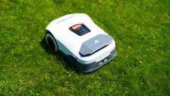 Anthbot Genie 3000 being tested in a bright green yard