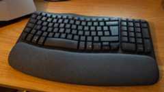 Logitech Wave Keys on wooden desk