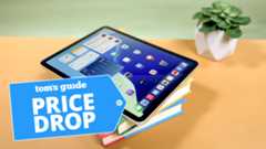 iPad Air shown on stack of books