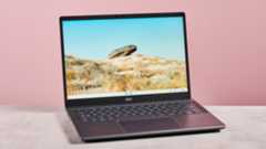 Acer Chromebook Plus 516 open on desk with pink background