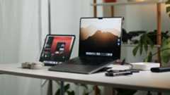 A MacBook and an iPad on a desk.