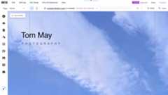 Website homepage featuring photo of clouds in a blue sky