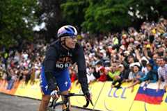 PARIS - CHAMPS-ELYSEES, FRANCE - JULY 27: Primoz Roglic of Slovenia and Team Red Bull - BORA - hansgrohe passing the Cote de la Butte Montmatre while fans cheers during the 112th Tour de France 2025, Stage 21 a 132.3km stage from Mantes-la-Ville to Paris - Champs-Elysees / #UCIWT / on July 27, 2025 in Paris - Champs-Elysees, France. (Photo by Dario Belingheri/Getty Images)