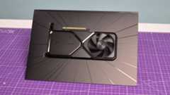 An Nvidia RTX 4070 Super on a purple deskmat on a desk