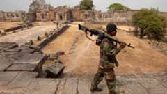 A Cambodian solider guards the grounds of the 11th-century Preah Vihear temple