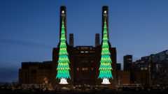 Apple projections of Christmas tree onto Battesea Power Station
