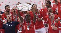 Bayern Munich players celebrate their Bundesliga title win in May 2016.