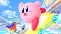 Kirby Air Riders key art showing Kirby blazing along on a warp star as spear waddle dee and metaknight are ahead