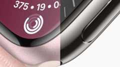 A half and half image of a rose gold aluminum watch and a stainless steel model