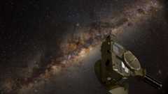 illustration of a spacecraft in deep space, with the milky way galaxy's glowing central bulge in the background