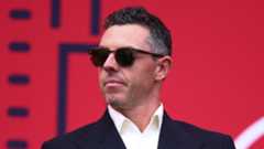 Rory McIlroy in suit and sunglasses ahead of the 2025 Ryder Cup