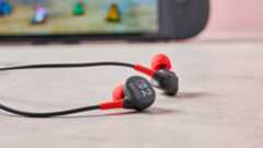 PowerA Wired Earbuds for Nintendo Switch 2 beside Switch 2 console