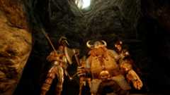 Best co-op games - Warhammer: Vermintide 2 - A party of four players stands together with weapons drawn.