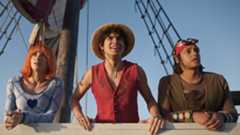 Nami, Luffy and Usopp standing on the deck of the Going Merry in live-action One Piece
