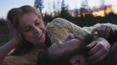 Joel Edgerton and Felicity Jones looking lovingly at each other in Train Dreams.