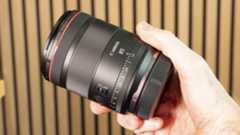 Canon RF 85mm F1.4L VCM lens in photographer's hands