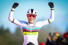 Netherlands' Lucinda Brand celebrates as she crosses the finish line to win the women's elite race of the 'Waaslandcross' cyclo-cross cycling event, stage 7 out of 7 of the Exact Cross competition in Sint-Niklaas on February 14, 2026. (Photo by DAVID PINTENS / Belga / AFP) / Belgium OUT