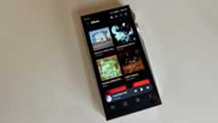 Astell & Kern A&ultima SP4000 portable music player on a white surface