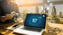 A shopping cart logo on a laptop screen.