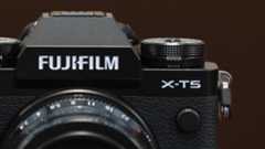The Fujifilm X-T5 camera sitting on a table