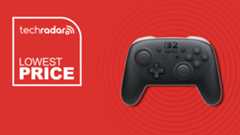 The black Nintendo Switch 2 Pro Controller against a red background