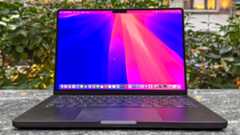 MacBook Pro 14-inch (2024, M4) shown open on a table