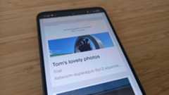 Website being edited in Squarespace on mobile phone on desk