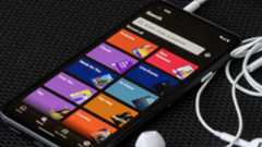 The user interface of the Spotify mobile app is seen on a Google Pixel 4a smartphone