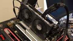 A PNY GeForce RTX 4060 Verto on a table with its retail box