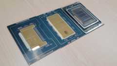 A photo of Intel CPUs; Clearwater Forest, Granite Rapids, and a Gaudi 3 accelerator.