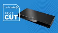 Panasonic DP-UB820 on blue background with price cut logo