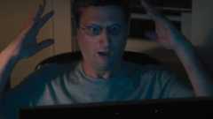 Tim Robinson as Ron Trosper, looking shocked