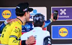 OVERIJSE, BELGIUM - APRIL 18: (L-R) Wout Van Aert of Belgium and Team Visma-Lease a Bike on second place, race winner Remco Evenepoel of Belgium and Team Soudal Quick-Step and Antonio Morgado of Portugal and Team UAE Team Emirates on third place pose and take a selfie on the podium ceremony after the 65th De Brabantse Pijl - La Fleche Brabanconne 2025 - Men's Elite a 162.6km one day race from Beersel to Overijse on April 18, 2025 in Overijse, Belgium. (Photo by Luc Claessen/Getty Images)