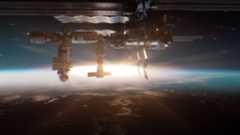 an image of the International Space Station in orbit above Earth