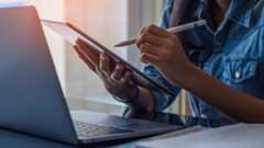 Best note-taking apps for heading back to school, a photo of a woman using a digital tablet