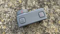 Image of the top side of an Akaso Brave 8 Lite action camera in someone's hand