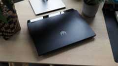 A closed laptop sitting on a desk